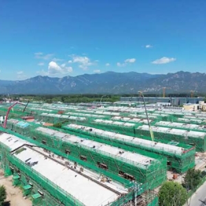 北京延庆镇西北片区安置房封顶 村民明年可住新居